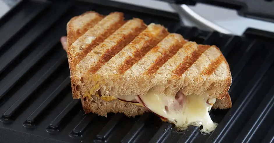 Leftover food residue on your sandwich grill can cause your toasties to stick to its surface.