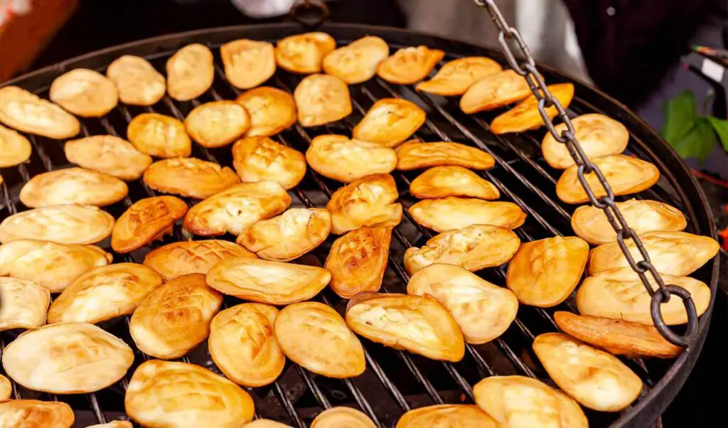 Traditional Polish oscypek on a grill.